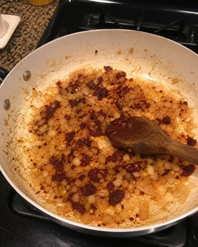 Soften the Onion and Caramelize the Tomato Paste